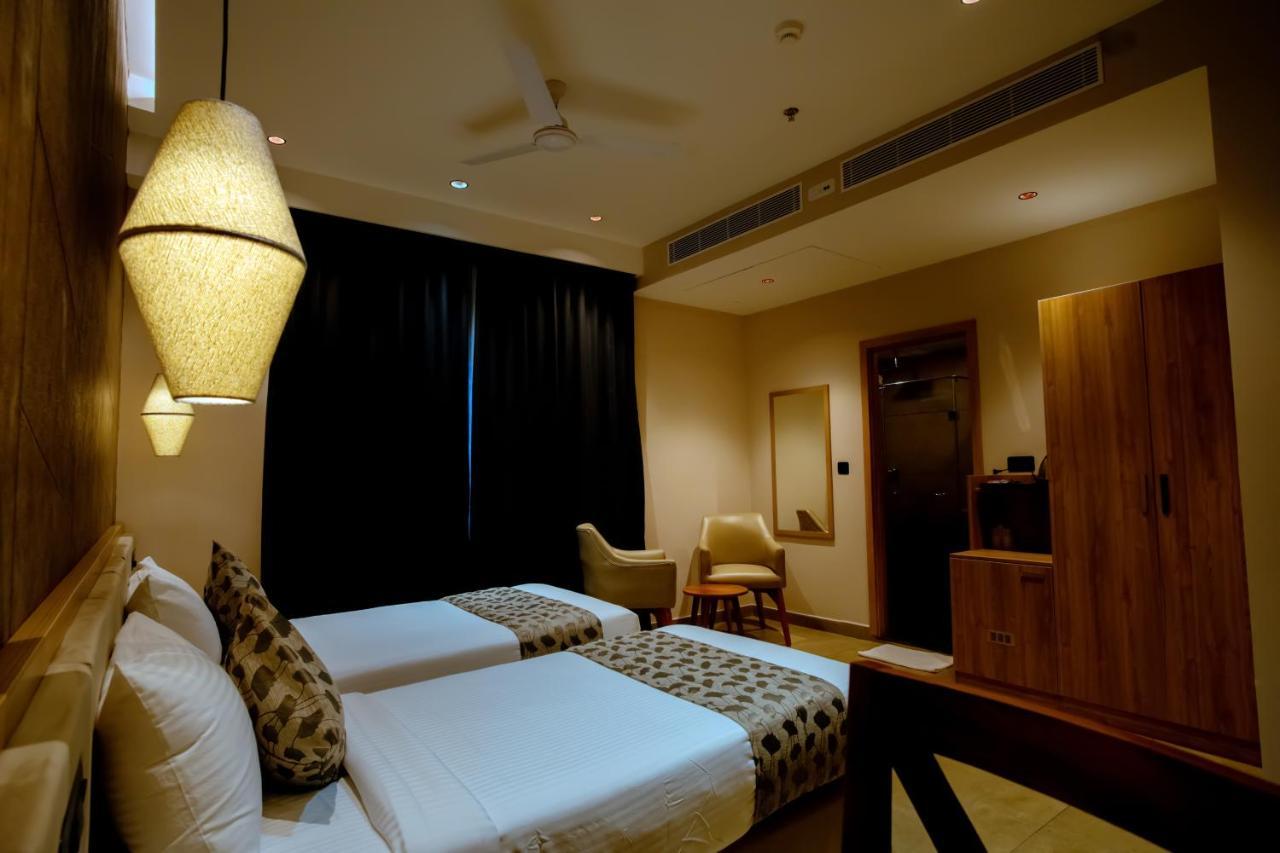 Hotel Beeza Clubhouse à Kottayam Extérieur photo